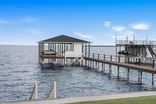 dock area with a water view