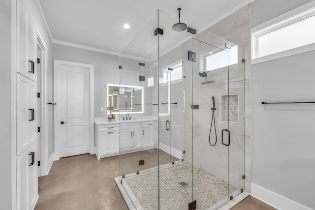 bathroom with ornamental molding, concrete floors, a wealth of natural light, and a shower with shower door