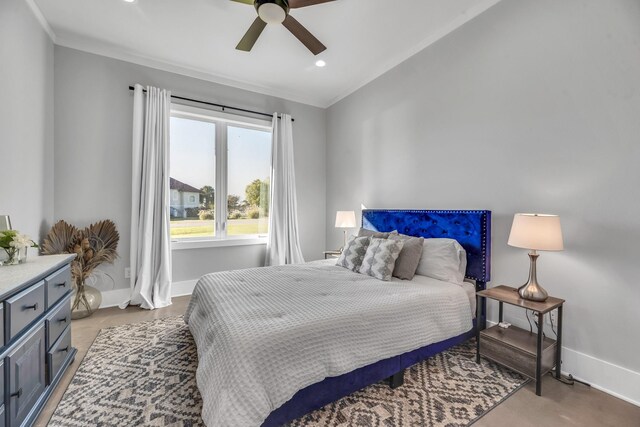 bedroom featuring ceiling fan, ornamental molding, and vaulted ceiling