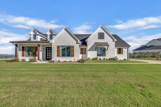 view of front of home featuring a front lawn