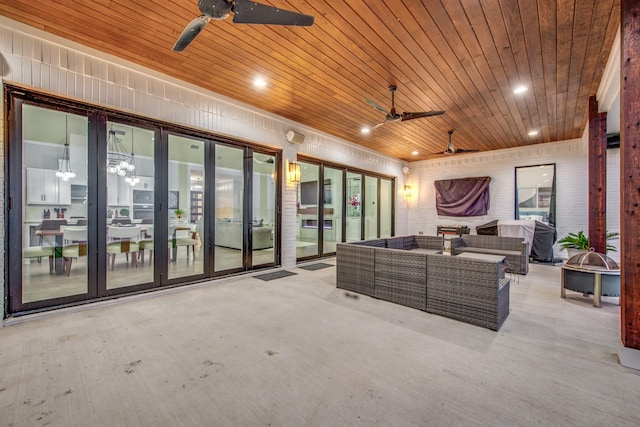 living room featuring wood ceiling and ceiling fan with notable chandelier