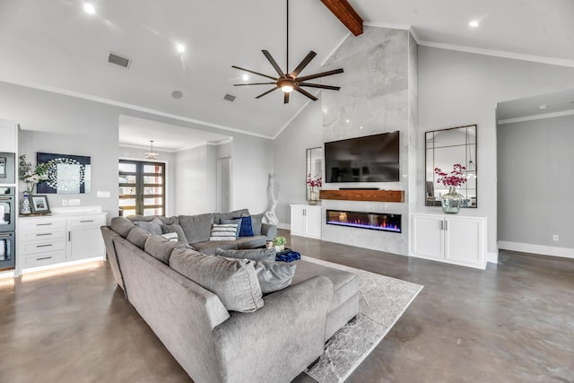 living room with ceiling fan, beamed ceiling, high vaulted ceiling, crown molding, and a tiled fireplace