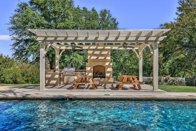 5804 Indianwood Ln, Fort Worth, TX 76132 - outdoor pool featuring a pergola, an outdoor stone fireplace, area for grilling, and a patio