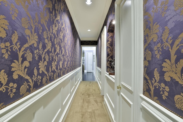 5804 Indianwood Ln, Fort Worth, TX 76132 - corridor with a wainscoted wall, crown molding, light colored carpet, wallpapered walls, and a decorative wall