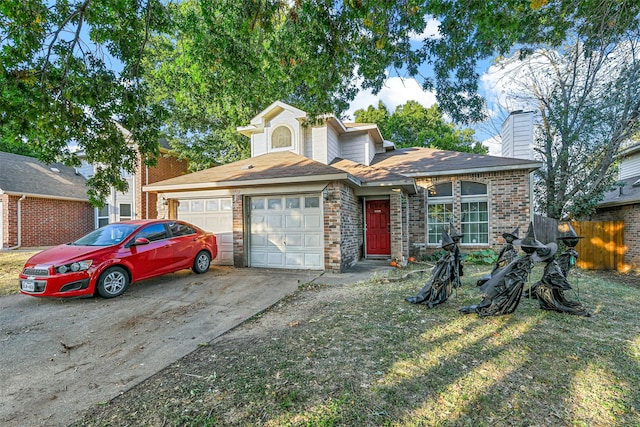 view of front of property featuring a garage