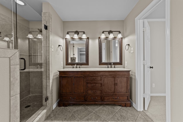 bathroom with vanity, tile patterned flooring, and an enclosed shower