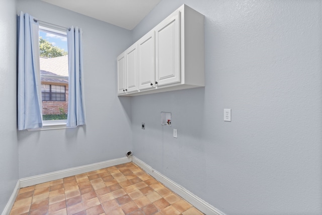 laundry area with cabinets, washer hookup, and electric dryer hookup