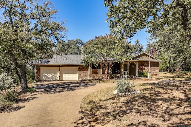 ranch-style house featuring a garage