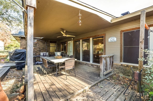 deck featuring a grill and ceiling fan