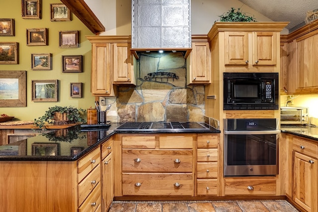 kitchen featuring decorative backsplash, a textured ceiling, dark stone counters, vaulted ceiling, and black appliances