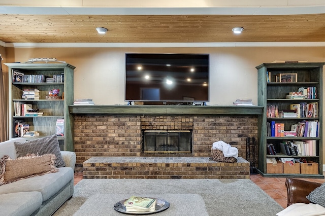 tiled living room featuring ornamental molding, wooden ceiling, and a brick fireplace