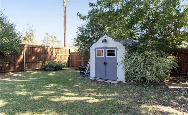 view of outdoor structure with a yard