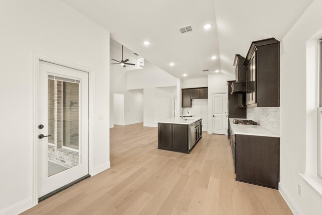 bathroom with vanity, tile patterned flooring, and plus walk in shower