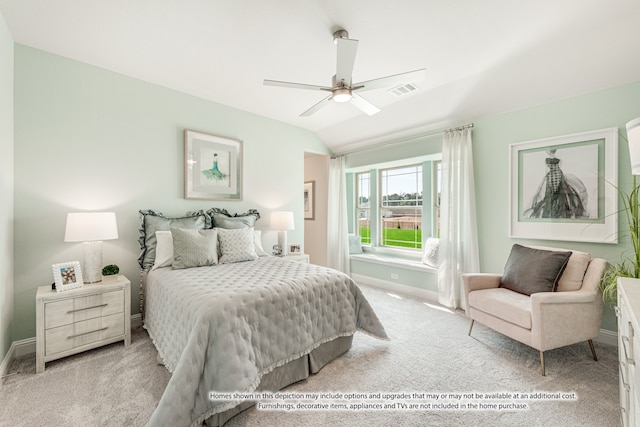 bedroom featuring ceiling fan, light carpet, and lofted ceiling