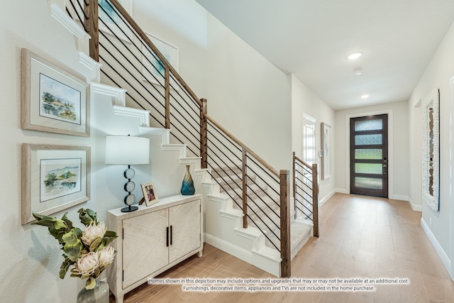 foyer with light wood-type flooring