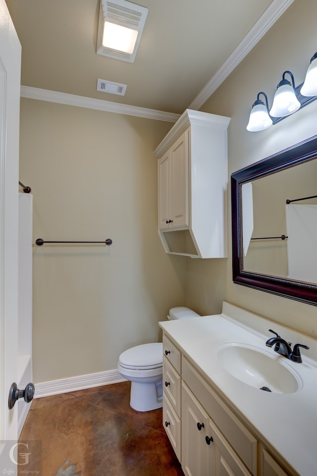 bathroom featuring vanity, crown molding, and toilet