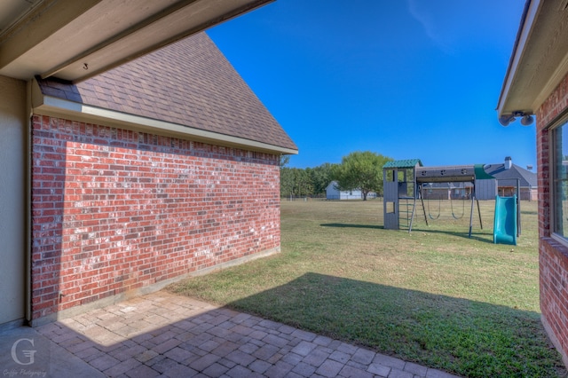 view of yard featuring a playground