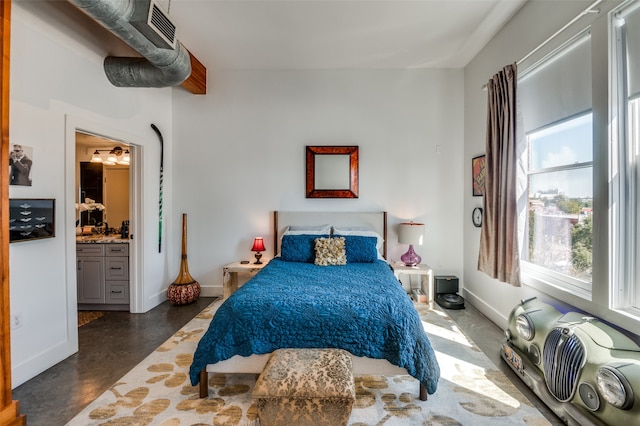 bedroom featuring ensuite bath