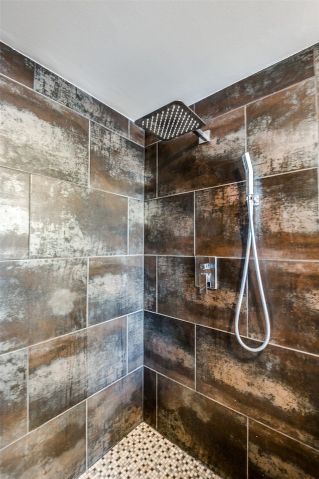 room details with a tile shower