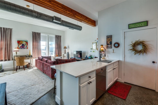 kitchen featuring kitchen peninsula, stainless steel dishwasher, sink, white cabinets, and beam ceiling