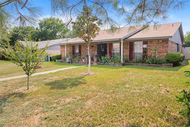 single story home with a front yard