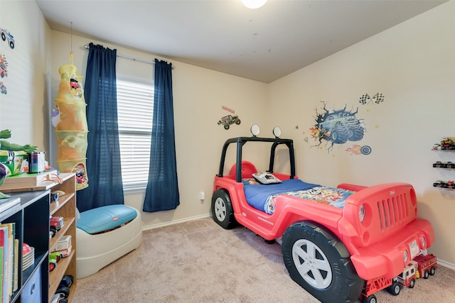 bedroom featuring light carpet