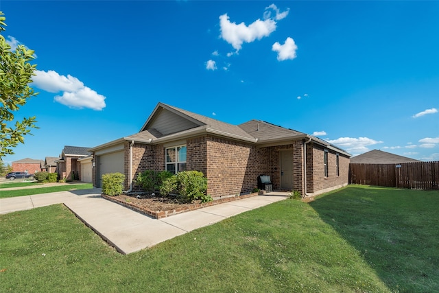 single story home with a front lawn and a garage