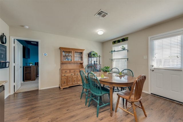 dining room featuring dark hardwood / wood-style floors