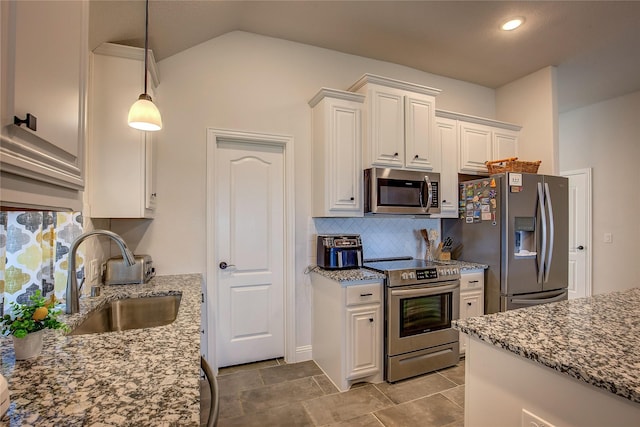4035 Three Forks Rd, Kaufman, TX 75142 - kitchen featuring stainless steel appliances, a sink, white cabinets, dark stone countertops, and decorative backsplash
