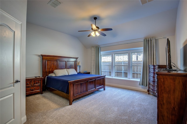 bedroom with light carpet, vaulted ceiling, and ceiling fan