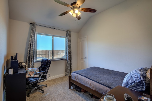 bedroom with ceiling fan, light colored carpet, and lofted ceiling