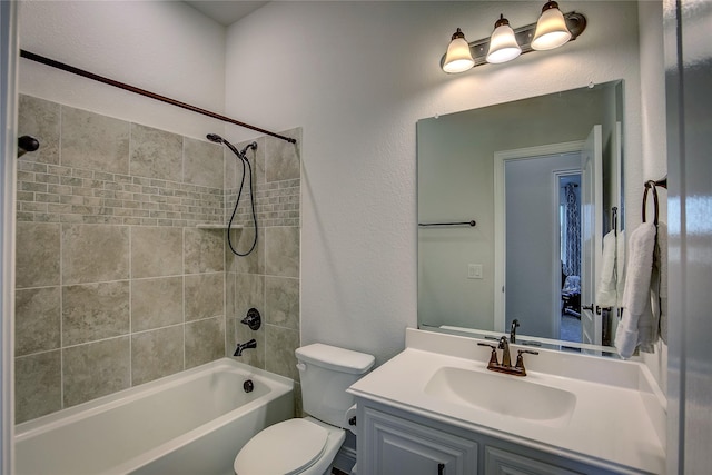 4035 Three Forks Rd, Kaufman, TX 75142 - full bath with toilet, vanity, shower / bathtub combination, and a textured wall