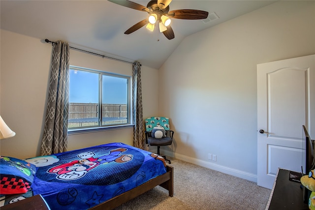 carpeted bedroom featuring vaulted ceiling and ceiling fan