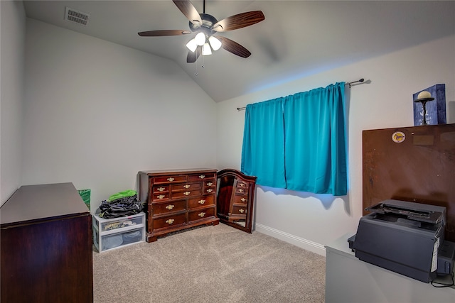 carpeted bedroom with ceiling fan and lofted ceiling