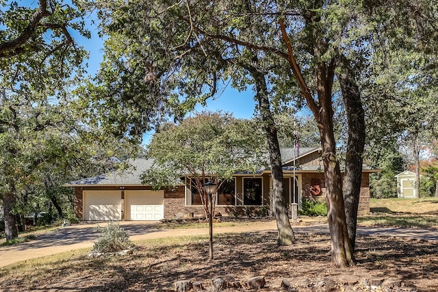 single story home featuring a garage