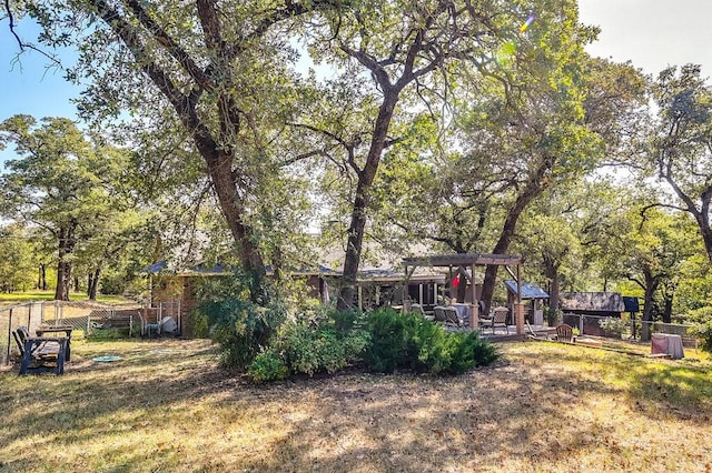 6040A Casey Ct, Fort Worth, TX 76140 - view of yard featuring fence and a pergola