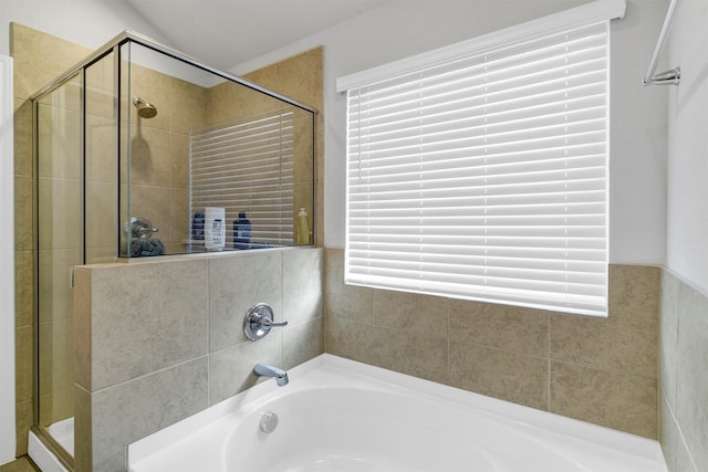 bathroom with independent shower and bath