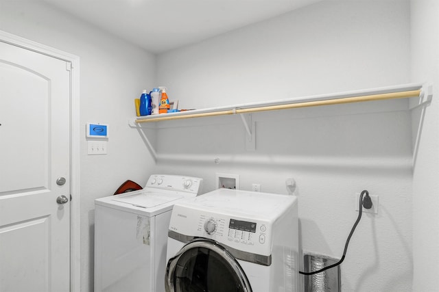 laundry area featuring independent washer and dryer