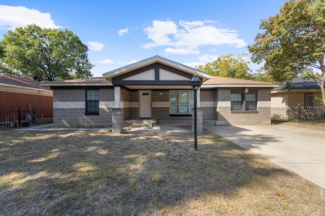 view of front of home with a front lawn