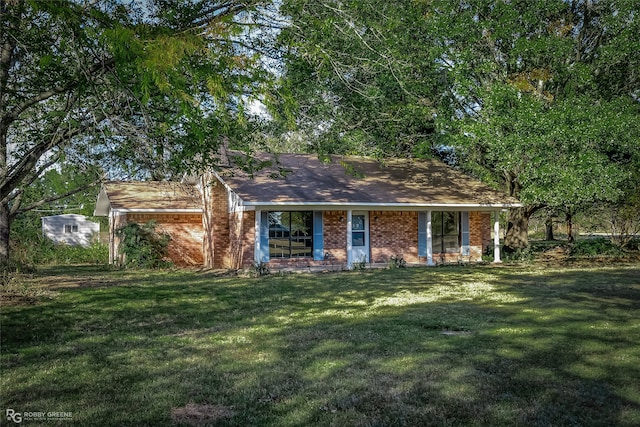 ranch-style home with a front lawn