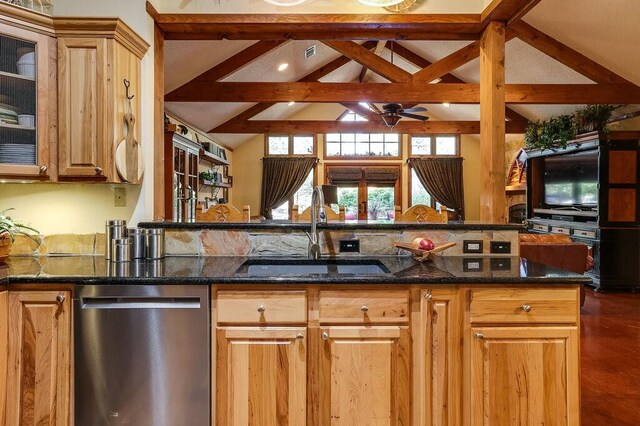6048 Casey Ct, Fort Worth, TX 76140 - kitchen featuring lofted ceiling with beams, ceiling fan, dark stone counters, a sink, and dishwasher