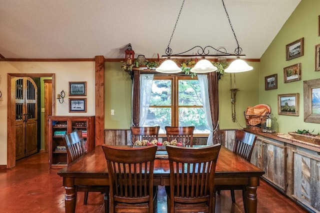 6048 Casey Ct, Fort Worth, TX 76140 - dining room with a wainscoted wall, concrete flooring, and a textured ceiling
