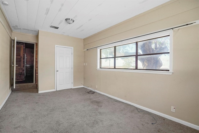 unfurnished bedroom featuring carpet flooring