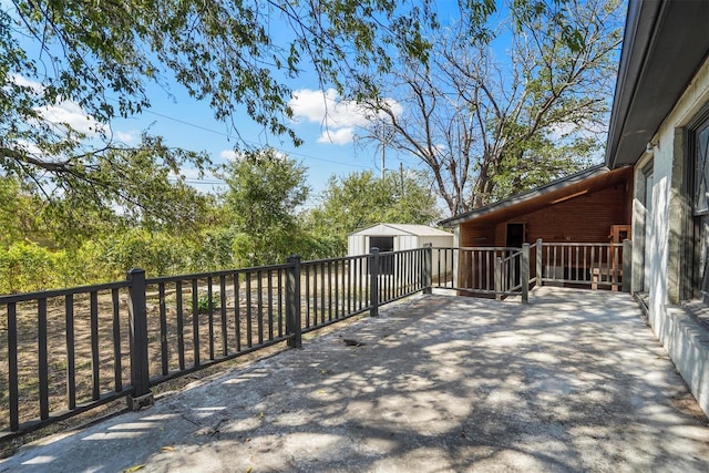 view of patio / terrace featuring an outbuilding