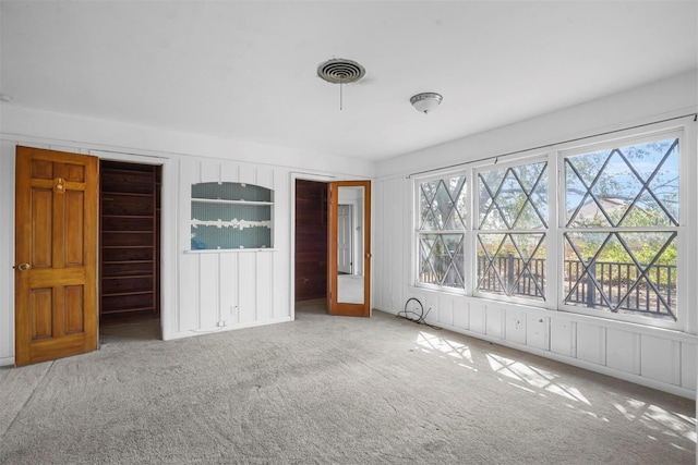 unfurnished bedroom featuring carpet