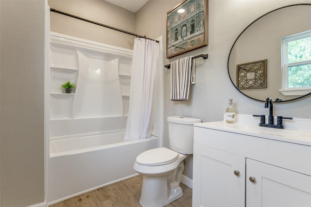 full bathroom featuring hardwood / wood-style floors, vanity, toilet, and shower / bath combination with curtain