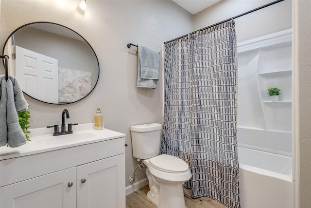 full bathroom featuring toilet, vanity, shower / tub combo, and hardwood / wood-style floors