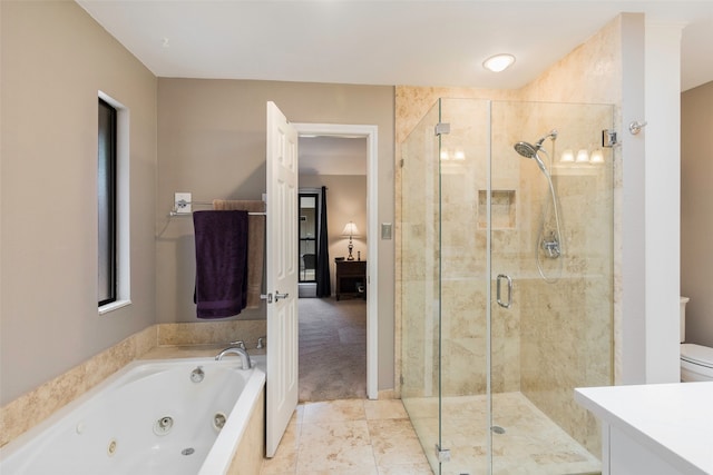 full bathroom with toilet, vanity, and shower with separate bathtub