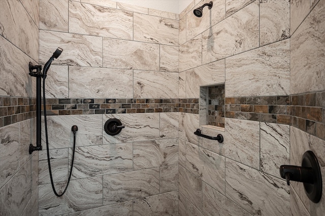 details featuring tiled shower