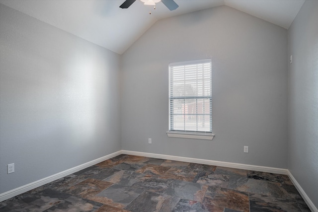 spare room with lofted ceiling and ceiling fan